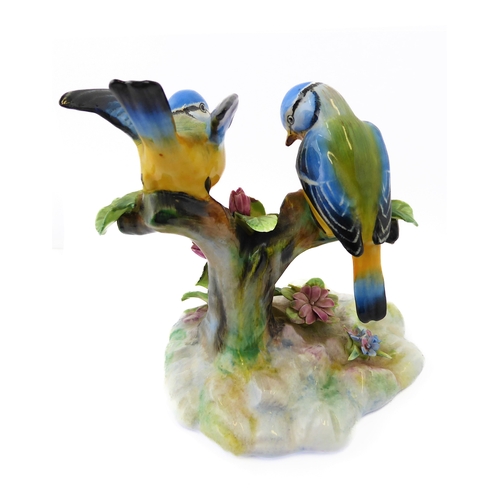 22 - Two Adderley floral bone china ornaments, 'Treble Blue Tit' and 'Blue Tit'; printed and gold painted... 