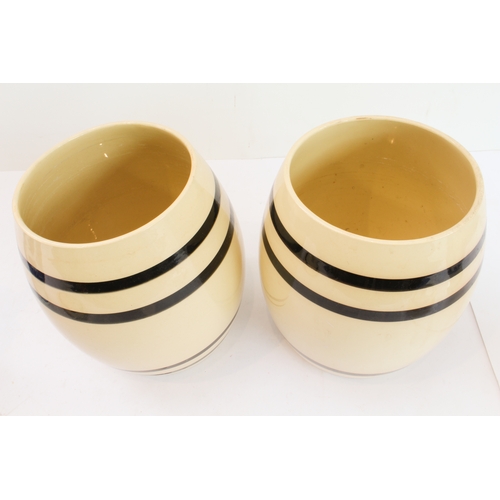 27 - Four pieces:
 1. a pair of late 19th to early 20th century Boch (La Louvière) pottery storage jars a... 