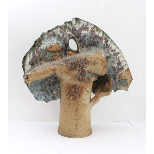 30 - An interesting contemporary free-form sculpture of a stylised tree, part-glazed earthenware, unsigne... 