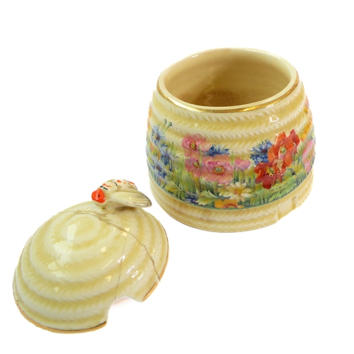 5 - Two Royal Doulton figures modelled by F.G. Doughty and a Clarice Cliff honey pot:
 1. 'The Parakeet'... 