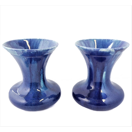 6 - A pair of Art Deco period Pilkingtons 'Lancastrian' blue-glaze ceramic vases: squat spherical form a... 