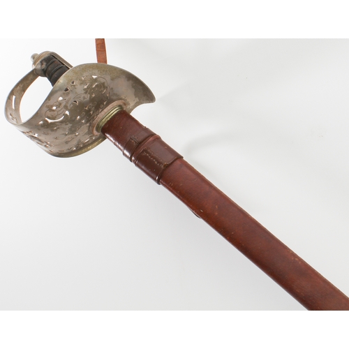 132 - A George V 1897 Pattern infantry officer's sword and leather scabbard by S. & J. Kitchin (Sheffield)... 