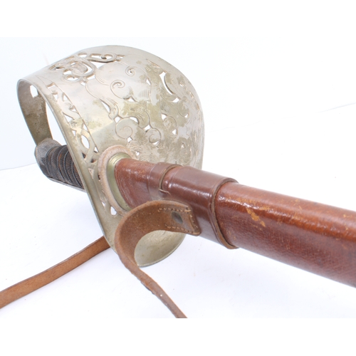132 - A George V 1897 Pattern infantry officer's sword and leather scabbard by S. & J. Kitchin (Sheffield)... 