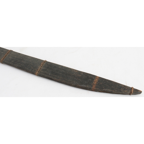 133 - Three bladed weapons:
 1. a machete-style knife (with later horn handle) and wooden scabbard (71 cm)... 
