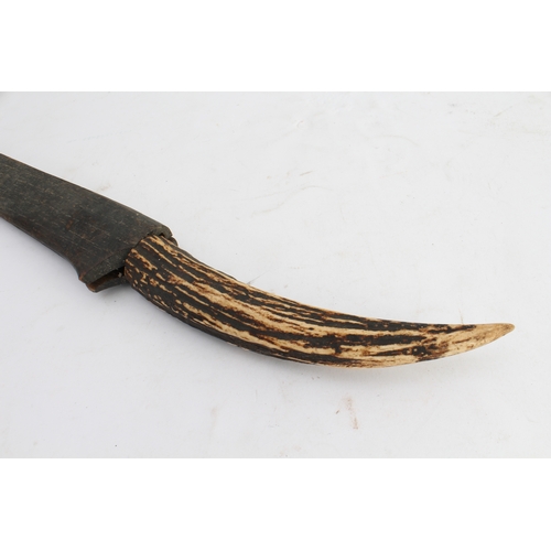 133 - Three bladed weapons:
 1. a machete-style knife (with later horn handle) and wooden scabbard (71 cm)... 