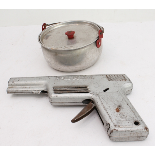 148 - An assortment of children's toys to include:
 two tinplate engines;
 a bell-pistol;
 kitchenware to ... 