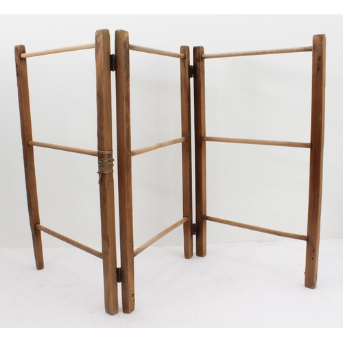 148 - An assortment of children's toys to include:
 two tinplate engines;
 a bell-pistol;
 kitchenware to ... 