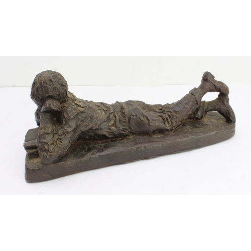 164 - KARIN JONZEN (1914-1998): 'Boy reclining and reading', cold-cast resin, monogrammed 'KJ', Heredities... 