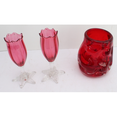 44 - Six pieces:
 a handmade claret-coloured textured vase, possibly Whitefriars (12cm high);
 a pair of ... 