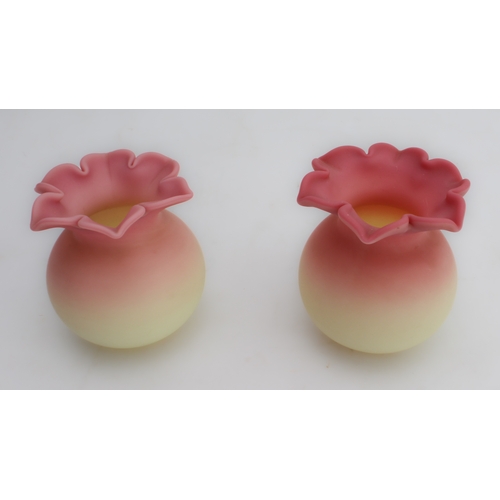 44 - Six pieces:
 a handmade claret-coloured textured vase, possibly Whitefriars (12cm high);
 a pair of ... 