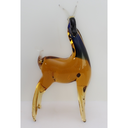 44 - Six pieces:
 a handmade claret-coloured textured vase, possibly Whitefriars (12cm high);
 a pair of ... 