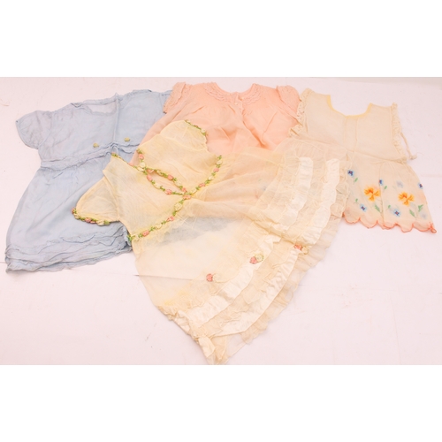 152 - A variety of collectibles to include a hand-decorated Oriental and other fans, baby's bibs, other la... 