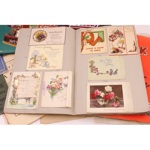 155 - Albums, hardback books, scrapbooks, prints and folios to include:
 three scrapbooks of greetings car... 