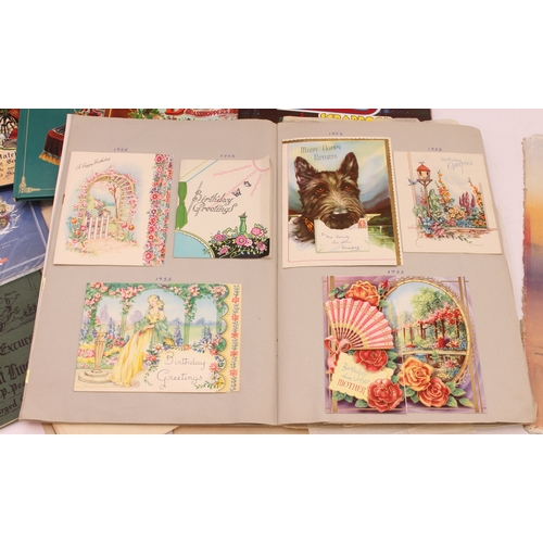 155 - Albums, hardback books, scrapbooks, prints and folios to include:
 three scrapbooks of greetings car... 