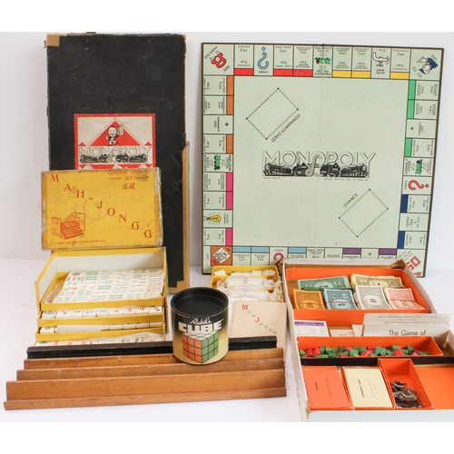 157 - Three 20th century games:
1. a 1930s Monopoly set (PAT. APP. For No. 3796-36).
2. an early to mid 20... 