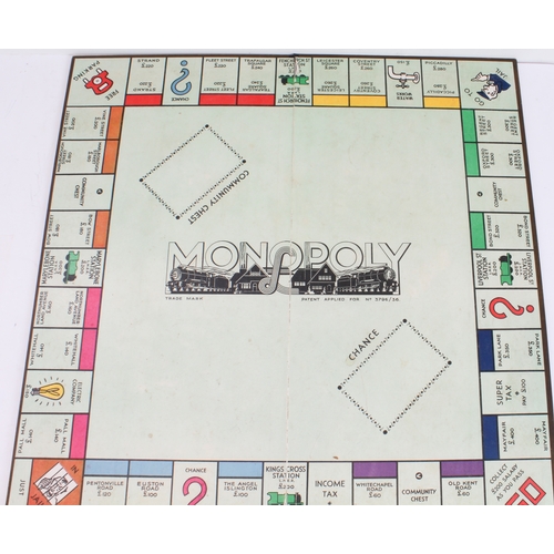 157 - Three 20th century games:
1. a 1930s Monopoly set (PAT. APP. For No. 3796-36).
2. an early to mid 20... 