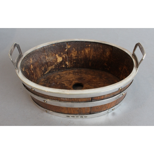 158 - An early 20th century coopered oak planter and a similar period silver-plate-mounted coopered two-ha... 