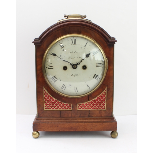 130 - An early 19th century mahogany-cased eight-day bracket clock; the repainted cream enamel dial signed... 