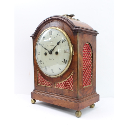 130 - An early 19th century mahogany-cased eight-day bracket clock; the repainted cream enamel dial signed... 