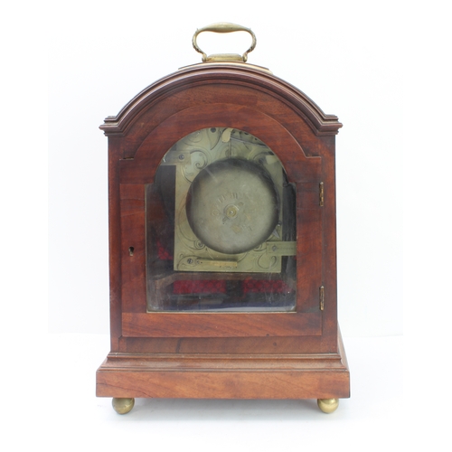 130 - An early 19th century mahogany-cased eight-day bracket clock; the repainted cream enamel dial signed... 