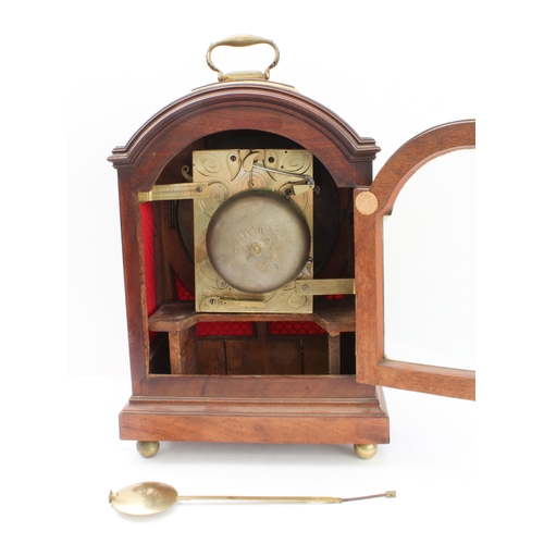 130 - An early 19th century mahogany-cased eight-day bracket clock; the repainted cream enamel dial signed... 