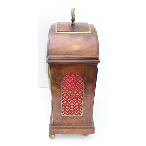 130 - An early 19th century mahogany-cased eight-day bracket clock; the repainted cream enamel dial signed... 