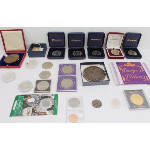 135 - A quantity of commemorative coins and crowns to include:
 a 1902 Edward VII coronation medal in its ... 