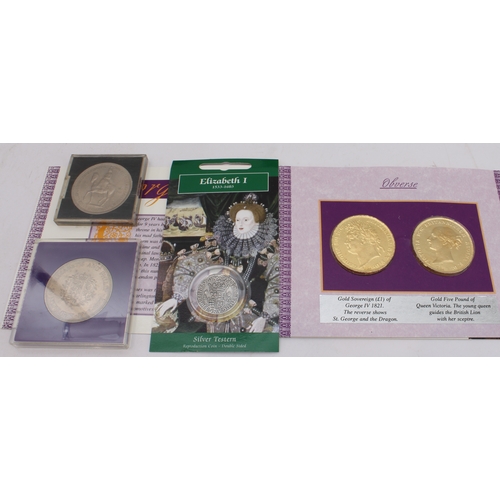 135 - A quantity of commemorative coins and crowns to include:
 a 1902 Edward VII coronation medal in its ... 