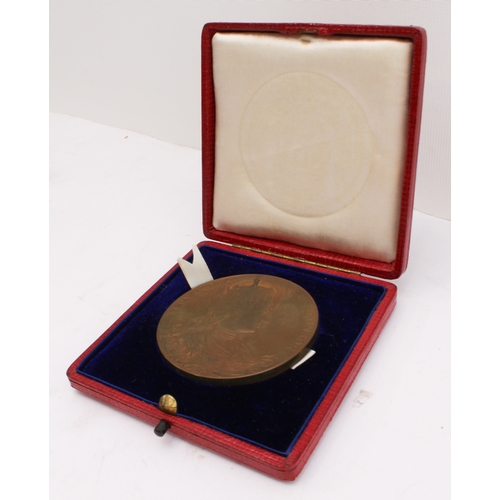 135 - A quantity of commemorative coins and crowns to include:
 a 1902 Edward VII coronation medal in its ... 