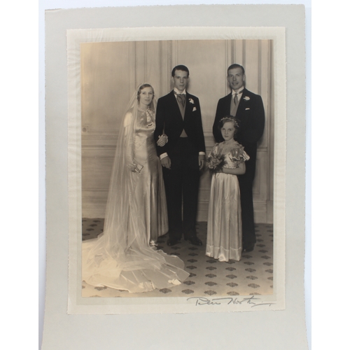 160 - An interesting folio of 1932 black-and-white wedding photographs:
 1. A hardback folio of five photo... 
