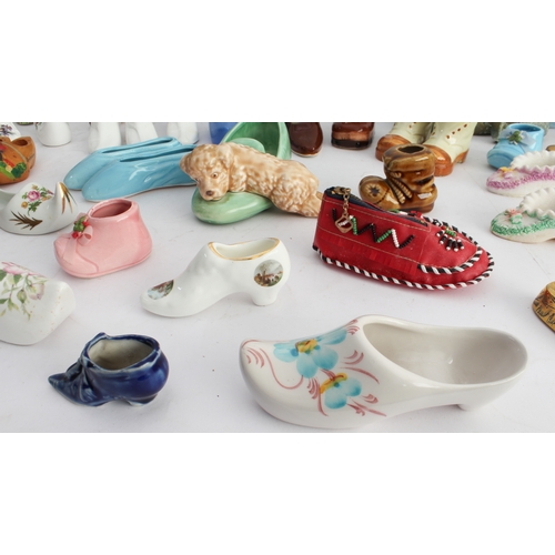 29 - 48 ornamental miniature shoes, clogs and boots (ceramic (31), glass (2), brass (4) and wood (5) to i... 