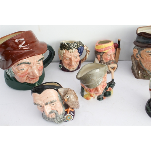 39 - Twenty-two Royal Doulton character jugs (3 large and 19 small). 
 3 large: Granny (D5521), Uncle Tom... 