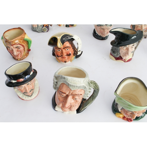 39 - Twenty-two Royal Doulton character jugs (3 large and 19 small). 
 3 large: Granny (D5521), Uncle Tom... 