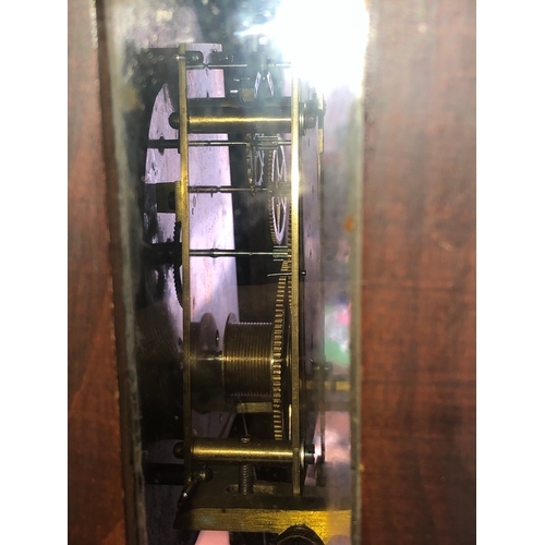 127 - A large 19th century walnut-cased continental Vienna regulator-style wall-hanging clock: the foliate... 