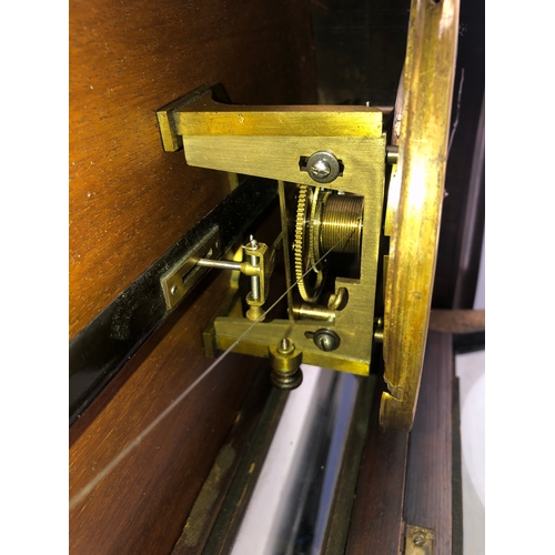 127 - A large 19th century walnut-cased continental Vienna regulator-style wall-hanging clock: the foliate... 