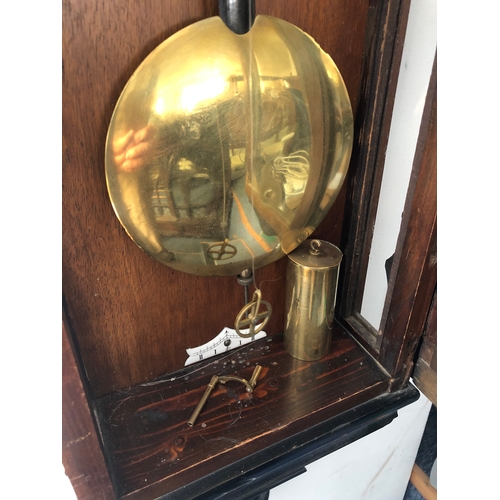 127 - A large 19th century walnut-cased continental Vienna regulator-style wall-hanging clock: the foliate... 