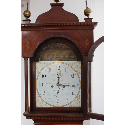 128 - An early 19th century figured mahogany eight-day longcase clock. The 13-inch broken-arch white-paint... 