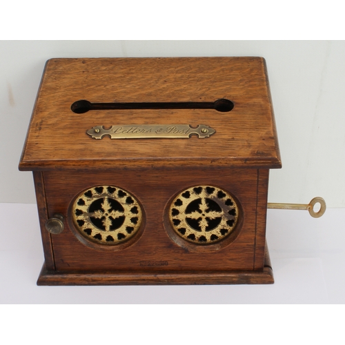 128 - A 19th century oak country house type letterbox with brass plaque marked 'Letters for Post with a sl... 