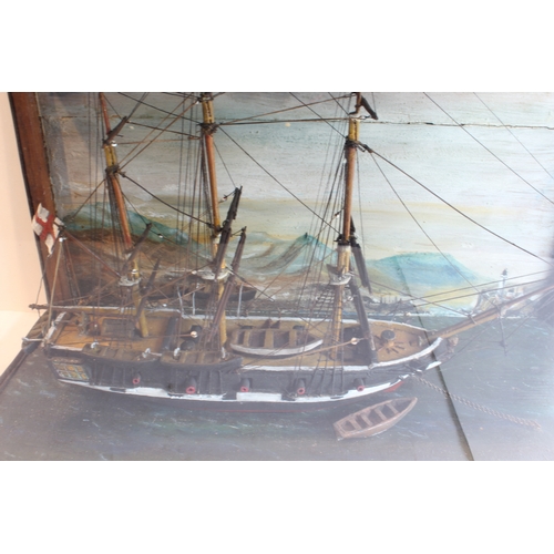 131 - A 19th century mahogany cased and glazed scratch-built diorama-style model of an English man o' war ... 