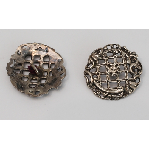 141 - A set of six early 20th century pierced hallmarked silver buttons in their original Mappin Brothers ... 