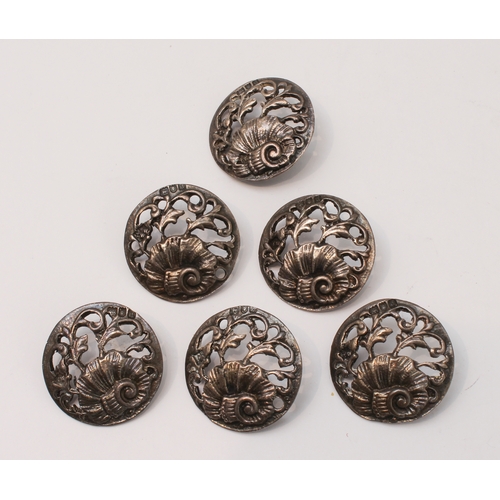 141 - A set of six early 20th century pierced hallmarked silver buttons in their original Mappin Brothers ... 