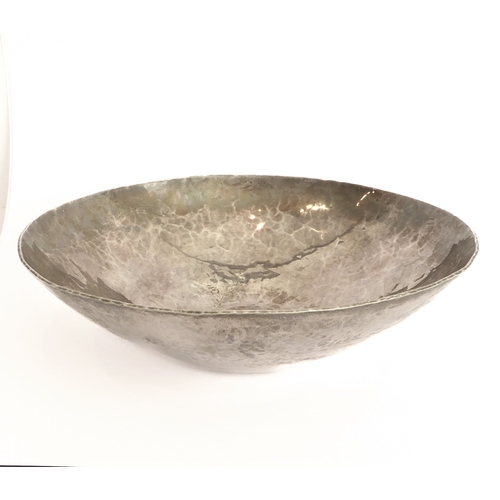 143 - A heavy 20th century hand-planished and hammered silver bowl: maker's mark JAC, assayed London 2003.... 