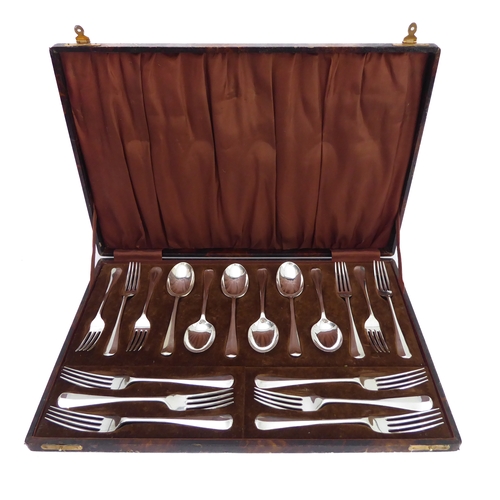 153 - A cased set of George VI silver Hanoverian pattern flatware: Josiah Williams & Co, London 1940, six ... 