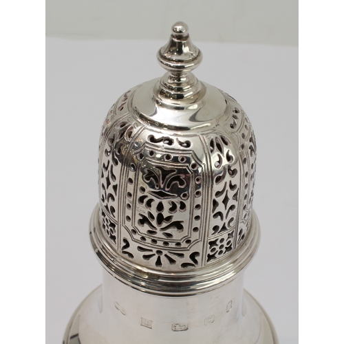 163 - A modern hallmarked silver caster in 18th century style: pierced domed top above a baluster body and... 