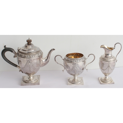 167 - A fine hallmarked silver three-piece bachelor's tea service comprising teapot, sugar and milk jug. E... 