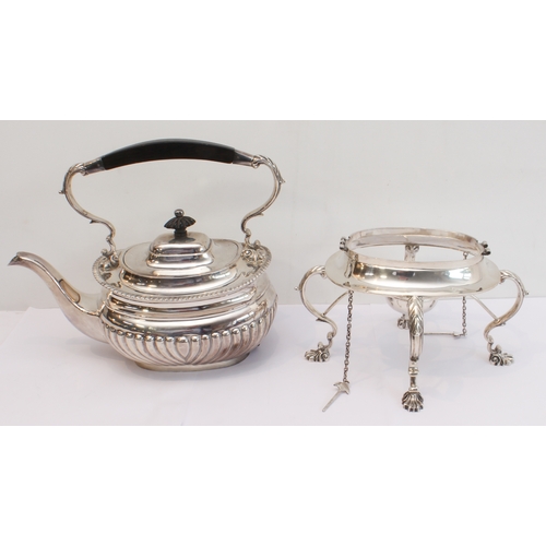 188 - A heavy hallmarked silver spirit kettle on stand. The kettle with tapering fluted bowed ebony handle... 