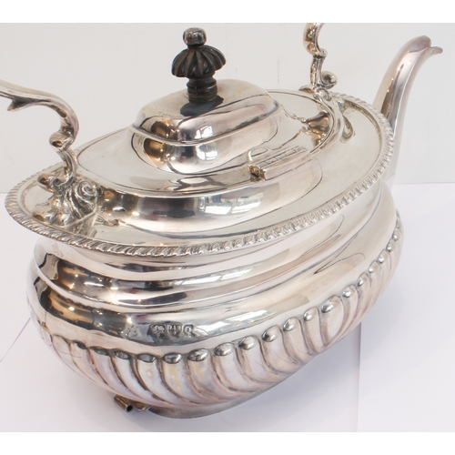 188 - A heavy hallmarked silver spirit kettle on stand. The kettle with tapering fluted bowed ebony handle... 