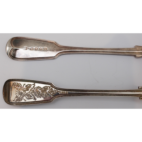 200 - A set of four mid-19th century silver berry spoons: fiddle and thread pattern with chased floral ter... 