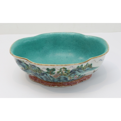 34 - A 20th century Chinese porcelain bowl of quatrefoil form: matt duck-egg blue glazed interior; the ex... 