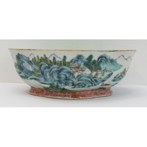 34 - A 20th century Chinese porcelain bowl of quatrefoil form: matt duck-egg blue glazed interior; the ex... 